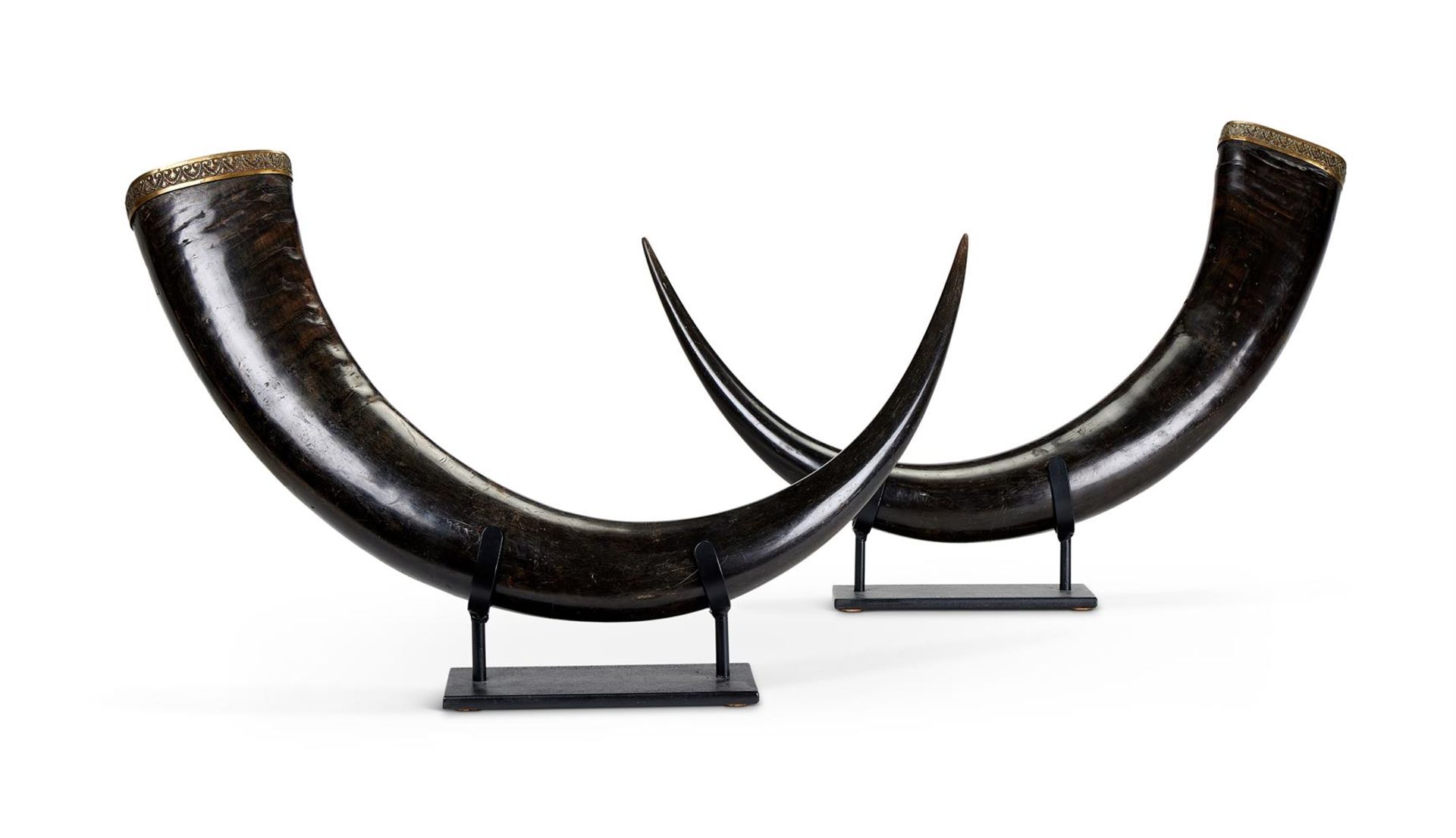 A PAIR OF BRASS MOUNTED BUFFALO HORNS, POSSIBLY SUMATRA