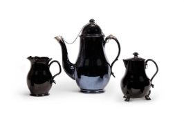 A LOW COUNTRIES BLACK GLAZED POTTERY AND SILVER MOUNTED COFFEE POT AND COVER (TERRE DE NAMUR)NAMUR