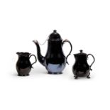 A LOW COUNTRIES BLACK GLAZED POTTERY AND SILVER MOUNTED COFFEE POT AND COVER (TERRE DE NAMUR)NAMUR