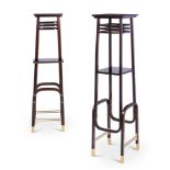 A PAIR OF AUSTRIAN ART NOUVEAU EBONISED BEECH AND BRASS MOUNTED STANDS