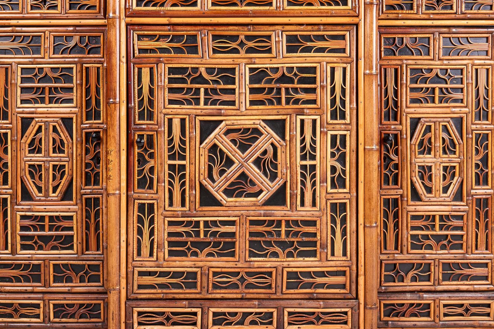 A BAMBOO, RATTAN, WALNUT AND PART EBONISED 'CHINOISERIE' BREAKFRONT SIDE CABINET - Image 5 of 5