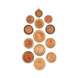 AFTER JEAN-BAPTISTE NINI (1717-1786) AND WORKSHOP- A SET OF THIRTEEN TERRACOTTA MEDALLIONS