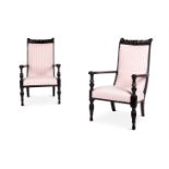 Y A MATCHED PAIR OF ANGLO-INDIAN EBONY OPEN ARMCHAIRS, SECOND HALF 19TH CENTURY