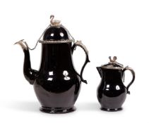 A LOW COUNTRIES BLACK GLAZED POTTERY & SILVER MOUNTED BALUSTER COFFEE POT AND COVER (TERRE DE NAMUR)
