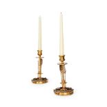 AN UNUSUAL PAIR OF GILT BRONZE AND SILVERED 'MARTIAL' CANDLESTICKS BY ANTONIO IUDICE