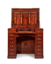 AN EMPIRE BRONZE MOUNTED, PARCEL GILT, AMBOYNA AND INLAID MAHOGANY DESK, CIRCA 1810