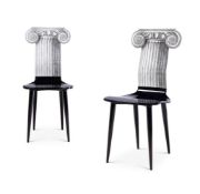 A PAIR OF 'CAPITELLO IONICO' CHAIRS BY PIERO FORNASETTI ORIGINALLY DESIGNED CIRCA 1950