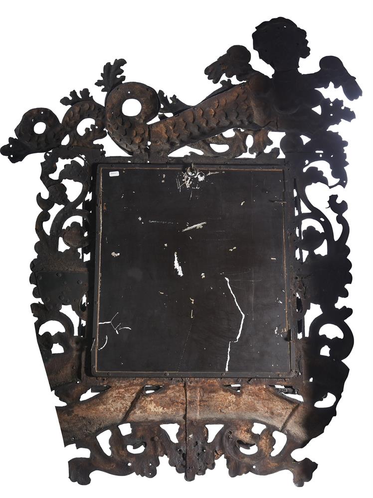 A PAIR OF GERMAN FORGED IRON OR STEEL MIRRORS PROBABLY AUGSBERG OR NURENBURG - Image 2 of 3