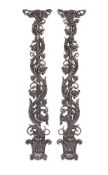 A PAIR OF POLISHED CAST IRON BALUSTER UPRIGHTS, LATE 19TH CENTURY