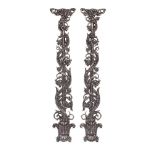 A PAIR OF POLISHED CAST IRON BALUSTER UPRIGHTS, LATE 19TH CENTURY