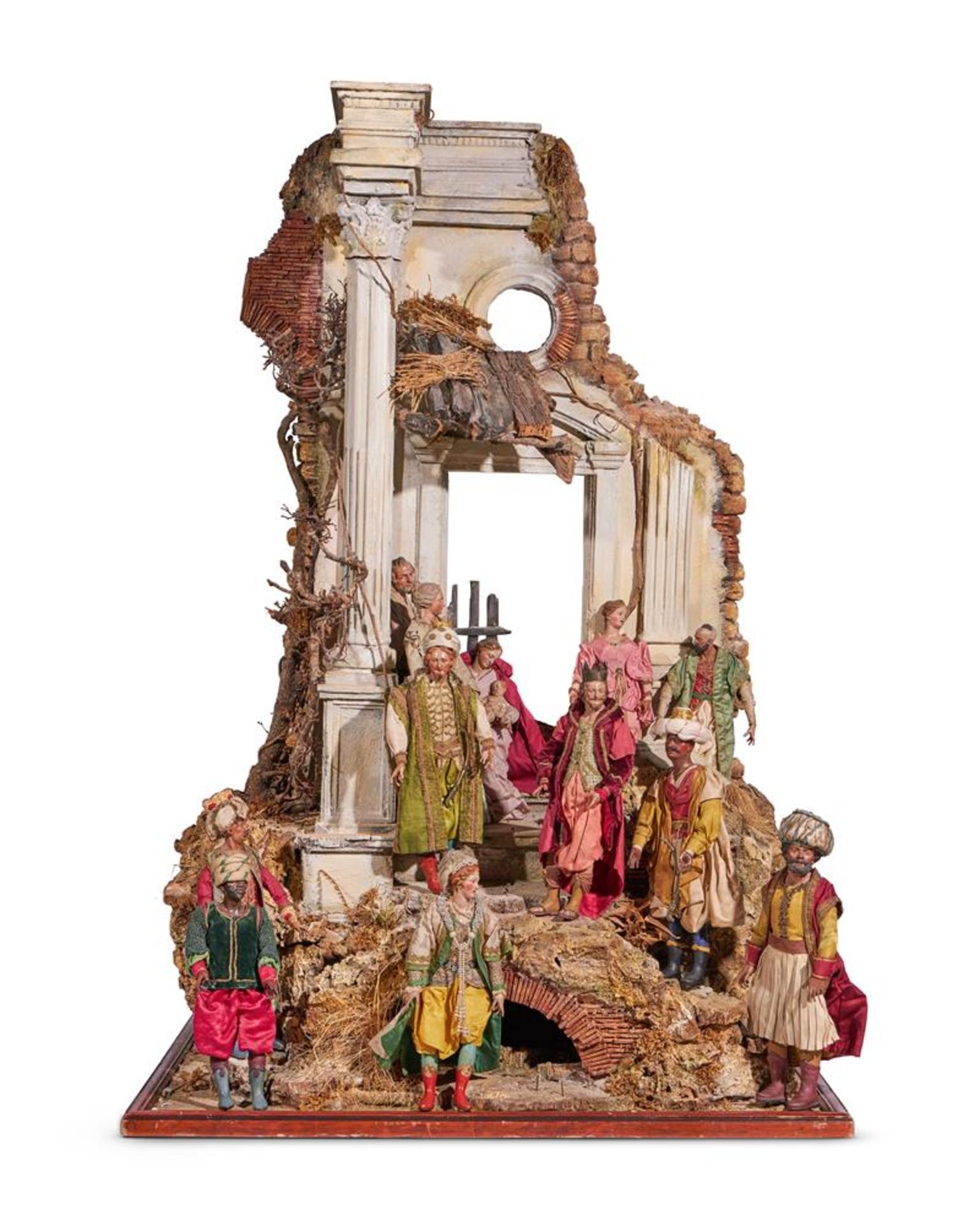 AN ITALIAN CARVED AND POLYCHROME CRÈCHE OF LARGE SIZE ,THE FIGURES NAPLES 18TH CENTURY AND LATER