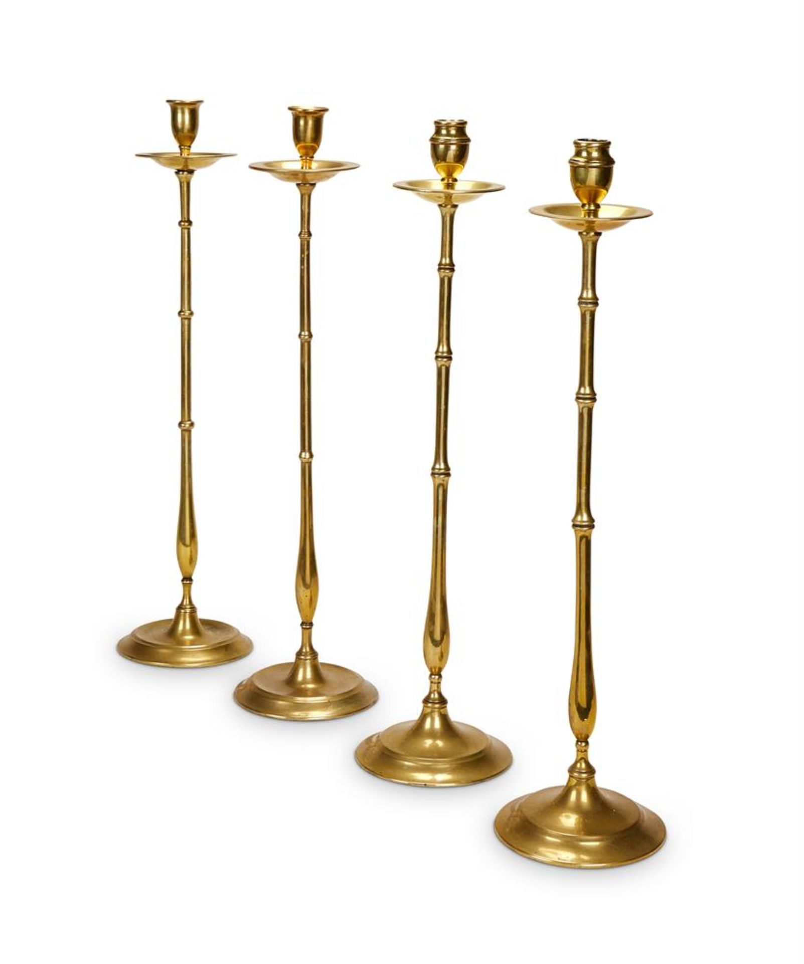 TWO PAIRS OF ARTS AND CRAFT BRONZE CANDLESTICKS, CIRCA 1890