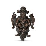 AN ITALIAN BRONZE DOOR KNOCKER WITH SATYR, 17TH CENTURY