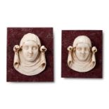 A PAIR OF ITALIAN STATUARY MARBLE FEMALE MASK PANELS, 17TH/18TH CENTURY