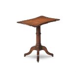 A WILLIAM IV FIGURED AND CARVED OAK 'ESTATE' TABLE, CIRCA 1830