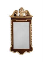 A GEORGE II MAHOGANY AND PARCEL GILT MIRROR, MID 18TH CENTURY