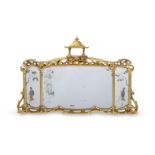 A CARVED GILTWOOD MIRROR, IN GEORGE III STYLE, IN THE MANNER OF THOMAS CHIPPENDALE, 19TH CENTURY
