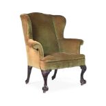 A GEORGE III MAHOGANY AND UPHOLSTERED WING ARMCHAIR, CIRCA 1770