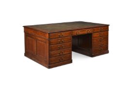 A WALNUT AND FEATHER BANDED PARTNER'S DESK, IN GEORGE III STYLE, 20TH CENTURY