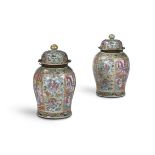 A LARGE PAIR OF CHINESE CANTON EXPORT FAMILLE VERTE TEMPLE JARS AND COVERS, LATE 19TH CENTURY