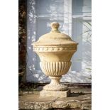 A COMPOSITION STONE LIDDED GARDEN URN, IN THE MANNER OF COADE AND SEALY, CONTEMPORARY