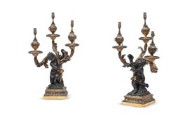 A PAIR OF FRENCH BRONZE AND GILT BRONZE THREE LIGHT CANDELABRA, LATE 19TH CENTURY