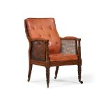 A REGENCY MAHOGANY LIBRARY BERGERE ARMCHAIR, ATTRIBUTED TO GILLOWS, CIRCA 1815