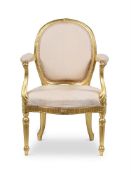 A GEORGE III CARVED GILTWOOD AND UPHOLSTERED ARMCHAIR, CIRCA 1770