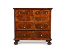 A WILLIAM & MARY BURR YEW, FIGURED WALNUT AND FEATHER BANDED CHEST OF DRAWERS, CIRCA 1690