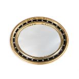 A VICTORIAN GILTWOOD, EBONISED AND CUT GLASS MOUNTED OVAL MIRROR, SECOND HALF 19TH CENTURY