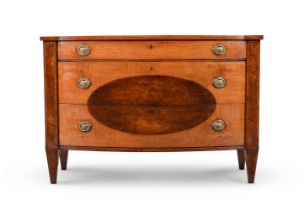 A GEORGE III HAREWOOD AND BURR YEW BOWFRONT COMMODE, CIRCA 1760
