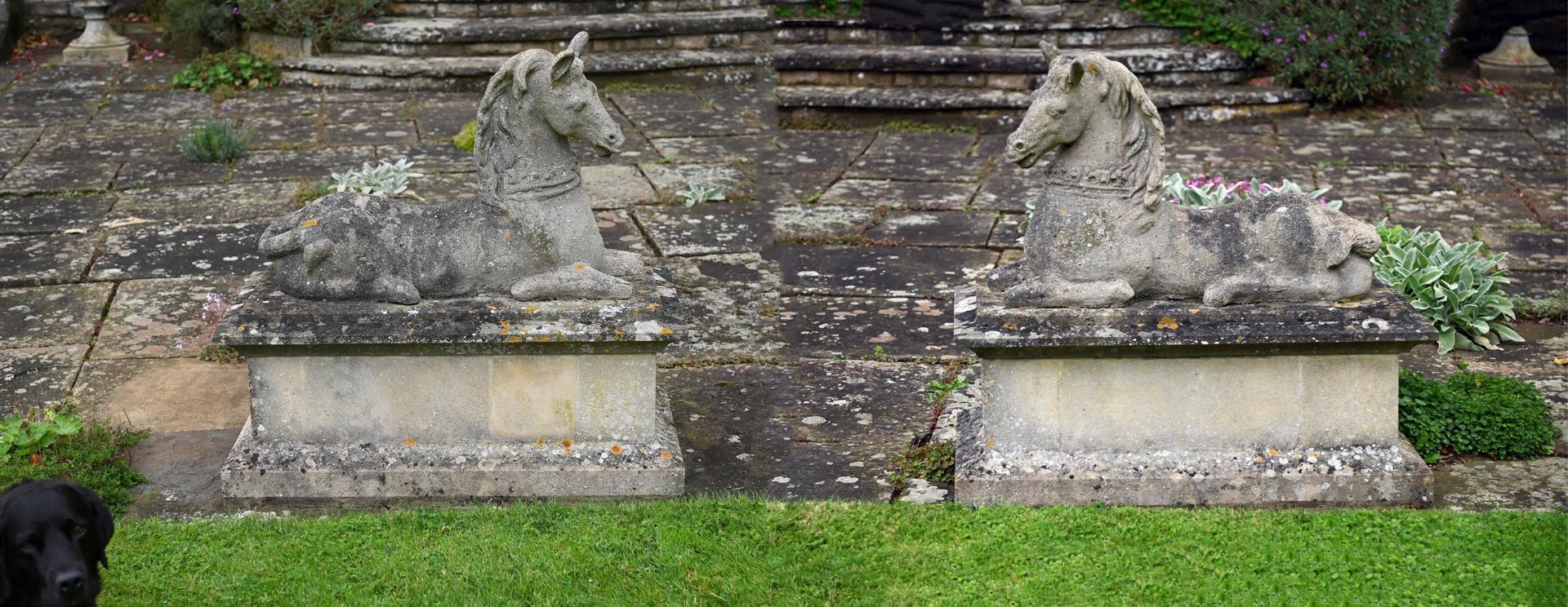 A PAIR OF COMPOSITION STONE MODELS OF RECUMBENT HORSES, 20TH CENTURY - Image 2 of 4