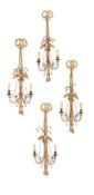 A SET OF FOUR GILTWOOD AND COMPOSITION TWIN BRANCH WALL LIGHTS, FIRST HALF 19TH CENTURY