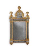 A LARGE CONTINENTAL CARVED GILTWOOD MIRROR, IN THE MANNER OF BURCHARD PRECHT