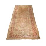 A LARGE TURKISH CARPET, approximately 552 x 285cm