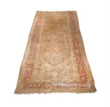 A LARGE TURKISH CARPET, approximately 552 x 285cm