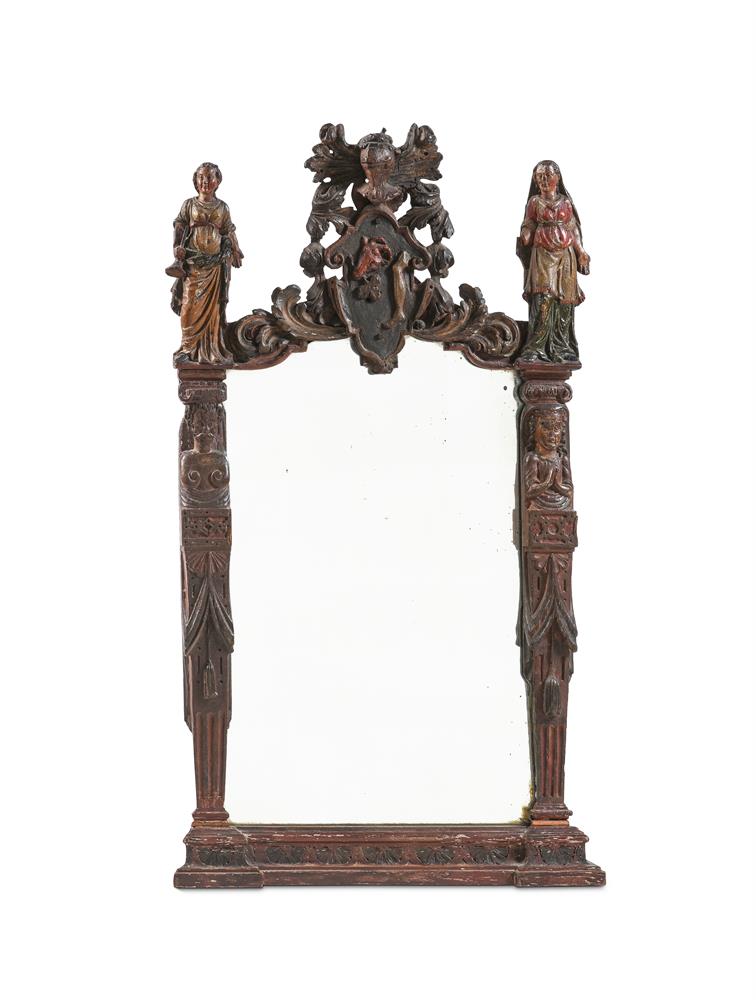 AN UNUSUAL CONTINENTAL CARVED OAK AND POLYCHROME PAINTED MIRROR, LATE 17TH OR EARLY 18TH CENTURY