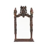 AN UNUSUAL CONTINENTAL CARVED OAK AND POLYCHROME PAINTED MIRROR, LATE 17TH OR EARLY 18TH CENTURY