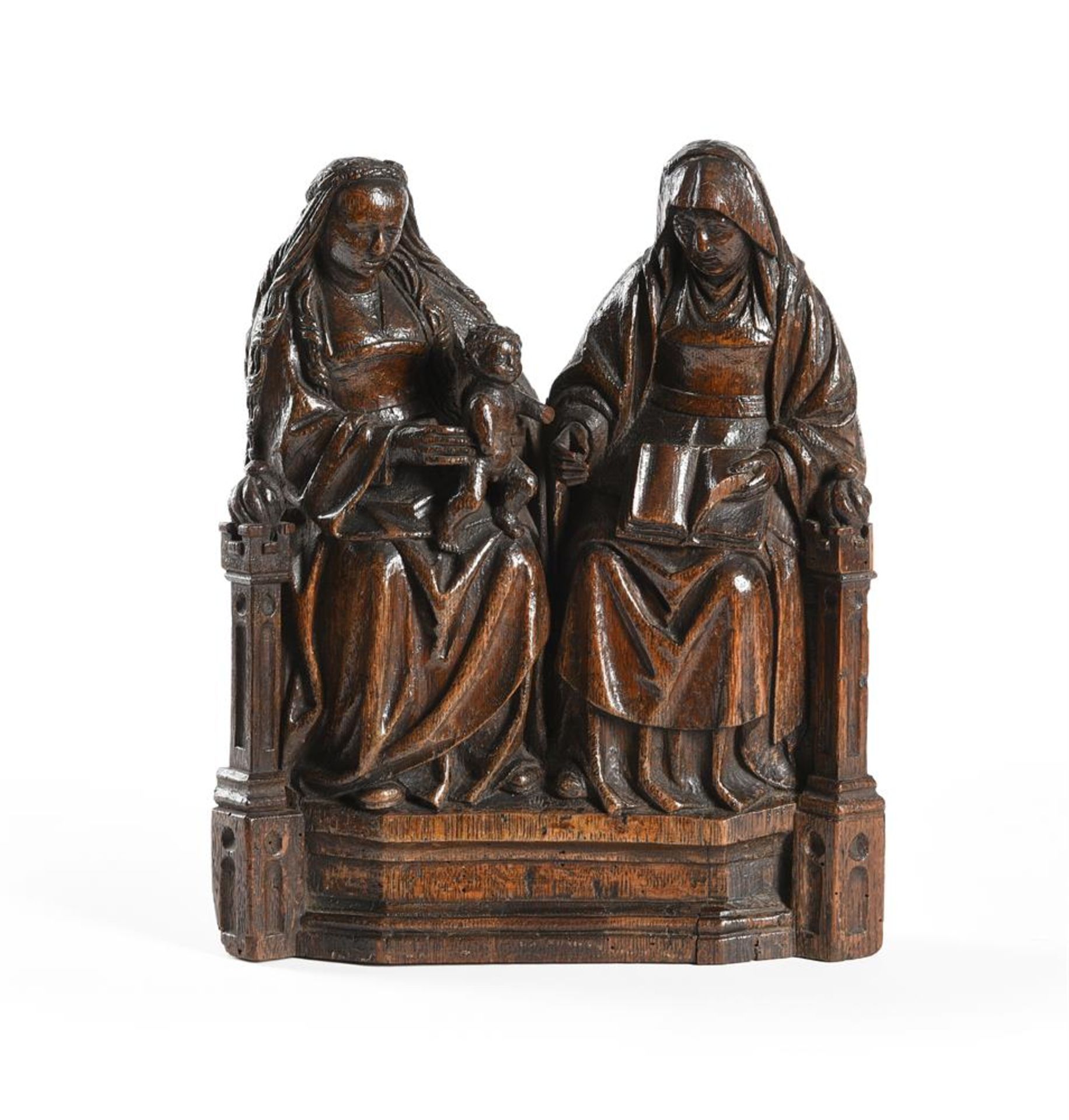 A CARVED OAK GROUP OF THE VIRGIN AND CHILD WITH SAINT ANNE 'ANNA SELBDRITT', ANTWERP