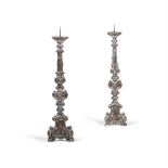 A TALL PAIR OF ITALIAN SILVERED PRICKET TOP CANDLESTICKS, 18TH CENTURY