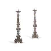 A TALL PAIR OF ITALIAN SILVERED PRICKET TOP CANDLESTICKS, 18TH CENTURY