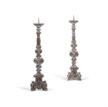 A TALL PAIR OF ITALIAN SILVERED PRICKET TOP CANDLESTICKS, 18TH CENTURY