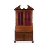 AN EARLY GEORGE III MAHOGANY BOOKCASE, IN THE MANNER OF WILLIAM HALLETT, CIRCA 1765