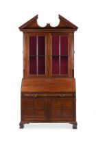 AN EARLY GEORGE III MAHOGANY BOOKCASE, IN THE MANNER OF WILLIAM HALLETT, CIRCA 1765