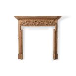 A VICTORIAN CARVED PINE CHIMNEYPIECE, MID 19TH CENTURY