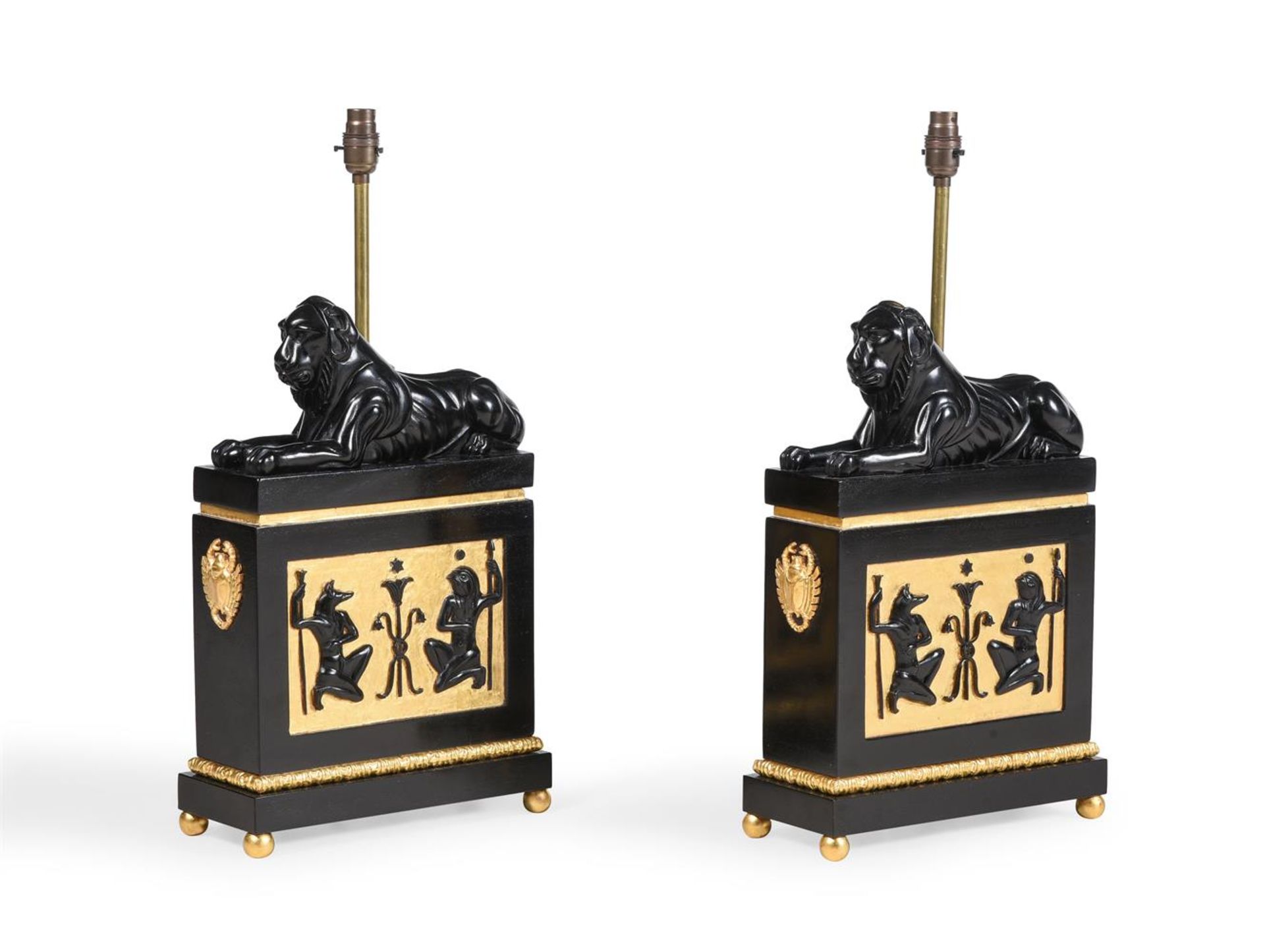 A PAIR OF EBONISED AND GILDED LAMPS, AFTER A DESIGN BY THOMAS HOPE, OF RECENT MANUFACTURE