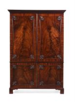 A GEORGE III MAHOGANY LINEN PRESS, IN THE MANNER OF THOMAS CHIPPENDALE, CIRCA 1770