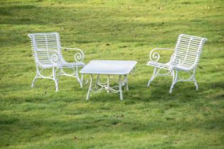 A HAND FORGED AND WHITE PAINTED GARDEN 'ARRAS' SUITE, OF RECENT MANUFACTURE