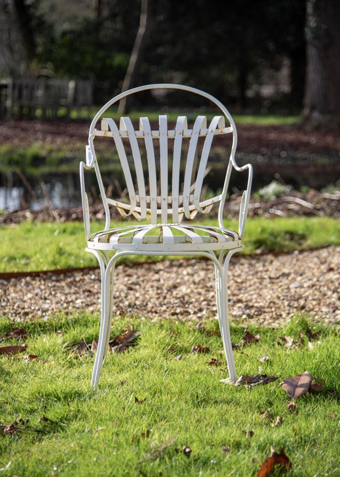 A HAND FORGED AND WHITE PAINTED 'BISTRO' GARDEN SUITE, OF RECENT MANUFACTURE - Image 2 of 2