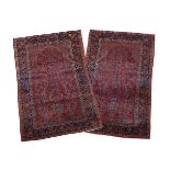 A PAIR OF KASHAN RUGS approximately 203 x 129 and 207 x 128cm respectively